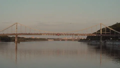 The general view of the pedestrian bridge overlooking the Dnipro  River. Video stock 248059379
