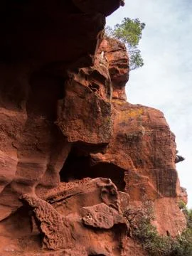 General view of the reddish caves of Can Riera very similar to the Antelope c Stock Photos
