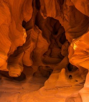 General view of the reddish caves of Can Riera very similar to the Antelope c Stock Photos