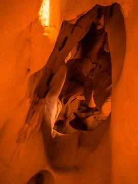 General view of the reddish caves of Can Riera very similar to the Antelope c Stock Photos