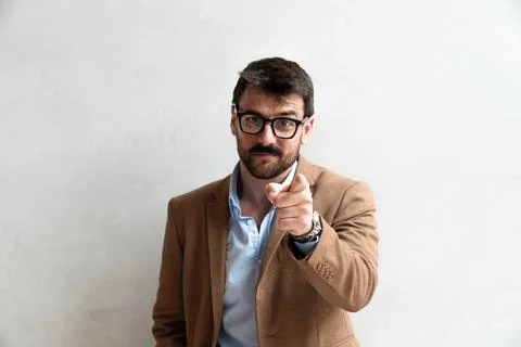 Generated imageClose up Smiling Young Businessman making faces Wearing Eyeg.. Stock Photos