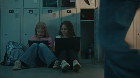 Generation Alpha Kids Engrossed in Gadgets in School Hallway Stock Footage 342025035