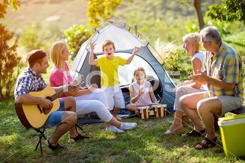 Generation family enjoying on summer day. Stock Photos