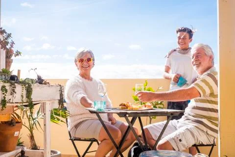 Generation group different ages on the terrace drinking and live together Stock-Fotos