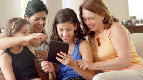 Generations of women using a tablet computer Video stock 49183377