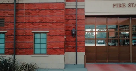 Generic Aerial Establishing Shot of Fire Station in USA. Left tracking shot.  Stock Footage 81055027