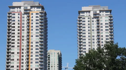 Generic Apartment Building with Clouds moving in behind.  CC Flat. Stock Footage 45594183