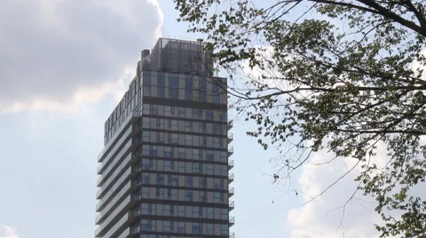 Generic Apartment Building with Clouds moving in behind.  CC Flat. Stock Footage 45616087