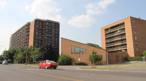 Generic Apartment Building with Clouds moving in behind.  CC Flat. Stock Footage 45616094