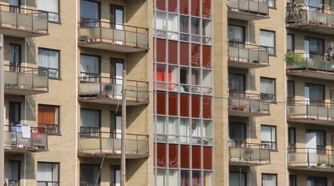 Generic Apartment Building with Clouds moving in behind.  CC Flat. Stock Footage 45616132