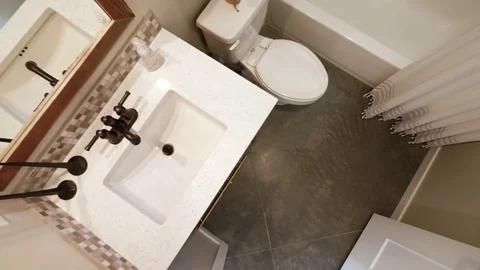 Generic Bathroom Overhead Lower and Rising in Doorway Stock Footage 76256155