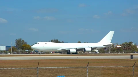 Generic Cargo Freighter White Unmarked Airplane Taxiing at Airport Stock Footage 102486773