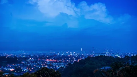 Generic cityscape time lapse from night to morning with rain Video stock 75513908