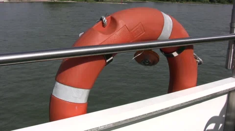 Generic clip of a rubber life ring on the side of a moving ship Stock Footage 52177319