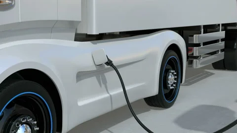 Generic design blue Heavy Electric Trucks charging at Public Charging Station Video stock 126563358