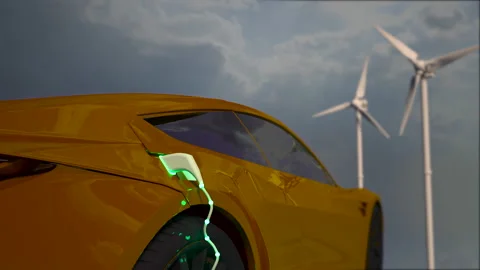 Generic electric orange car charging with solar panels and wind turbines in back Stock-Footage 163587749