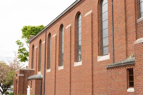 Generic establishing shot of side wall of typical church building or religiou Stock Photos
