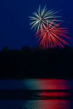 Generic Fireworks over a Dark Lake Stock Photos