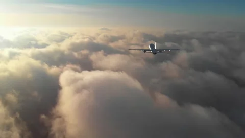 Generic jet airliner plane flying above the clouds at dawn. Realistic composite Stock Footage 158753003