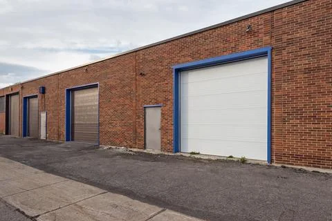 Generic loading dock of a small business building exterior Stock Photos