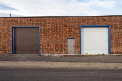 Generic loading dock of a small business building exterior Stock Photos