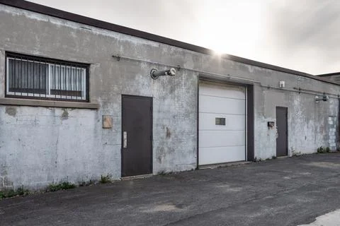 Generic loading dock of a small business building exterior Stock Photos