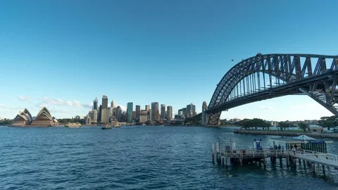 Generic modern cityscape timelapse in blue sky day time with ferry 스톡 동영상 79129430
