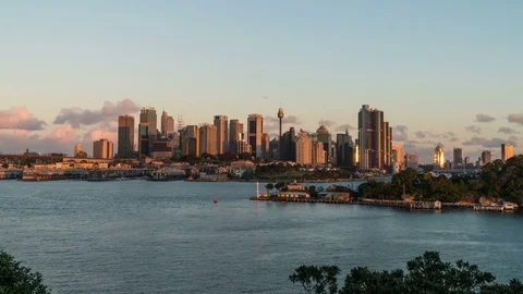 Generic modern cityscape timelapse from dusk to sunset with ferry Stock Footage 79133458