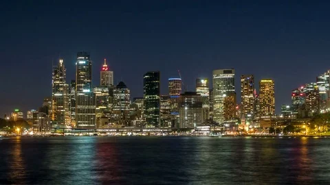Generic modern cityscape timelapse in night with ferry, Stock Footage 79105141