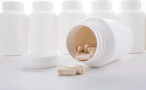 Generic Pill Bottle &amp; Capsules Photos