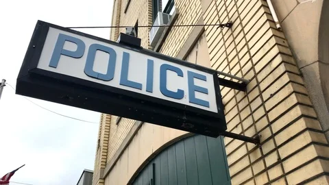 Generic Police station sign establishing exterior building Stock Footage