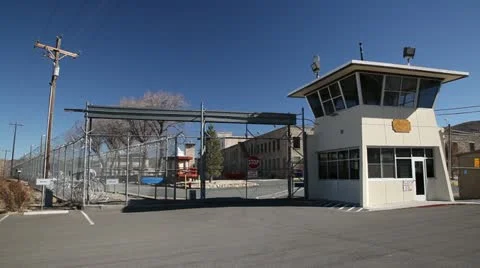 Generic prison gates with guard tower on beautiful sunny day, 976 Stock Footage 21746468