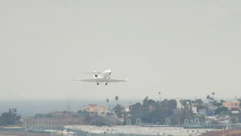 Generic Private Jet Taking Off from Runway at a Los Angeles Area Airport Video stock 245995890