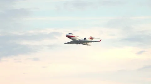 Generic Private Jet Taking Off into a Vibrant Orange Sky Stock Footage 245951951