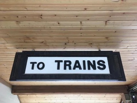 Generic sign directing passengers to the train Stock Photos