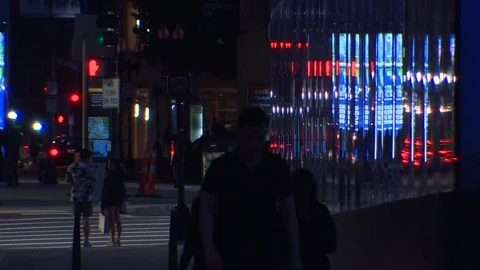 Generic Street Scene Evening. Reflections on Glass, People and Traffic Stock Footage 127249900
