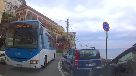 Generous Driver backs away to let traffic pass through narrow road, Amalfi Coast Stock-Footage 152720882