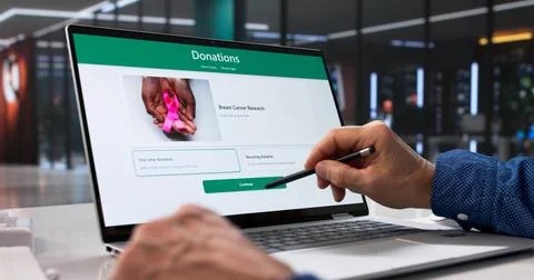 Generous Man Supporting Online Charity Through Social Media Donation App Stock Photos
