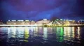 Geneva, beautiful view on evening city and embankment, reflections in water 4k or 4k+ Resolution