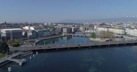 Geneva bridge with low traffic and police car - Aerial 4K Stock Footage 129571853