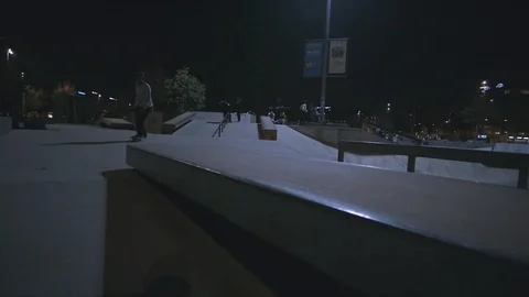 GENEVA, NOVEMBER 2018: Skate rider in skatepark in night slowmotion Stock-Footage 99092853