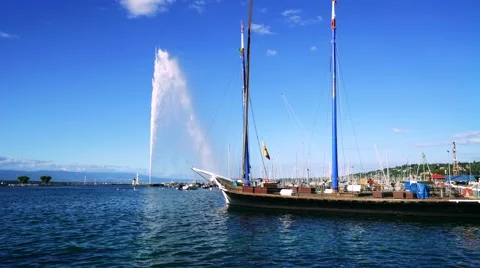 Geneva's Fountain Behind Wooden Ship Stock Footage