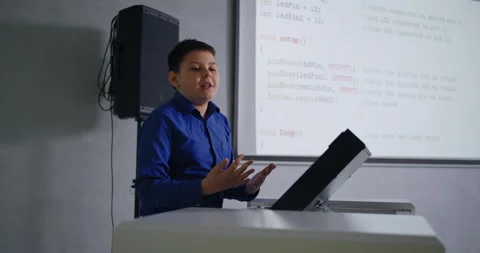 Genius Schoolboy Speaking In Classroom, Presenting Program Code In Programming Stock Footage 280173632