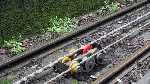 Genoa Funicular, Traction cables stopped and pan towards the tunnel Stock Footage 289625008