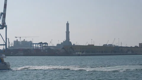 Genoa Lanterna lighthouse in port harbor and boats ships sea Video stock 150410542