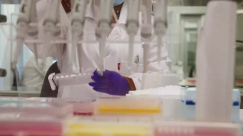 Genomics Lab -  looking troght test tubes Stock Footage 272155759