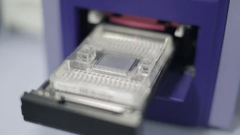Genotyping Analysis Machine - Removing the Biochip Video stock 69850502