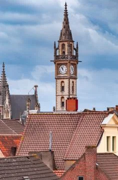 Gent. Clock tower at sunset. Stock Photos