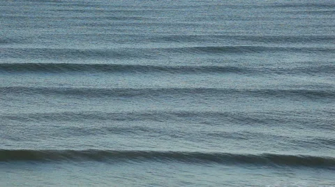 Gentle beach waves viewed from above Stock Footage 49227208