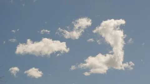 Gentle Clouds Float by in Real Time Stock Footage 105268315